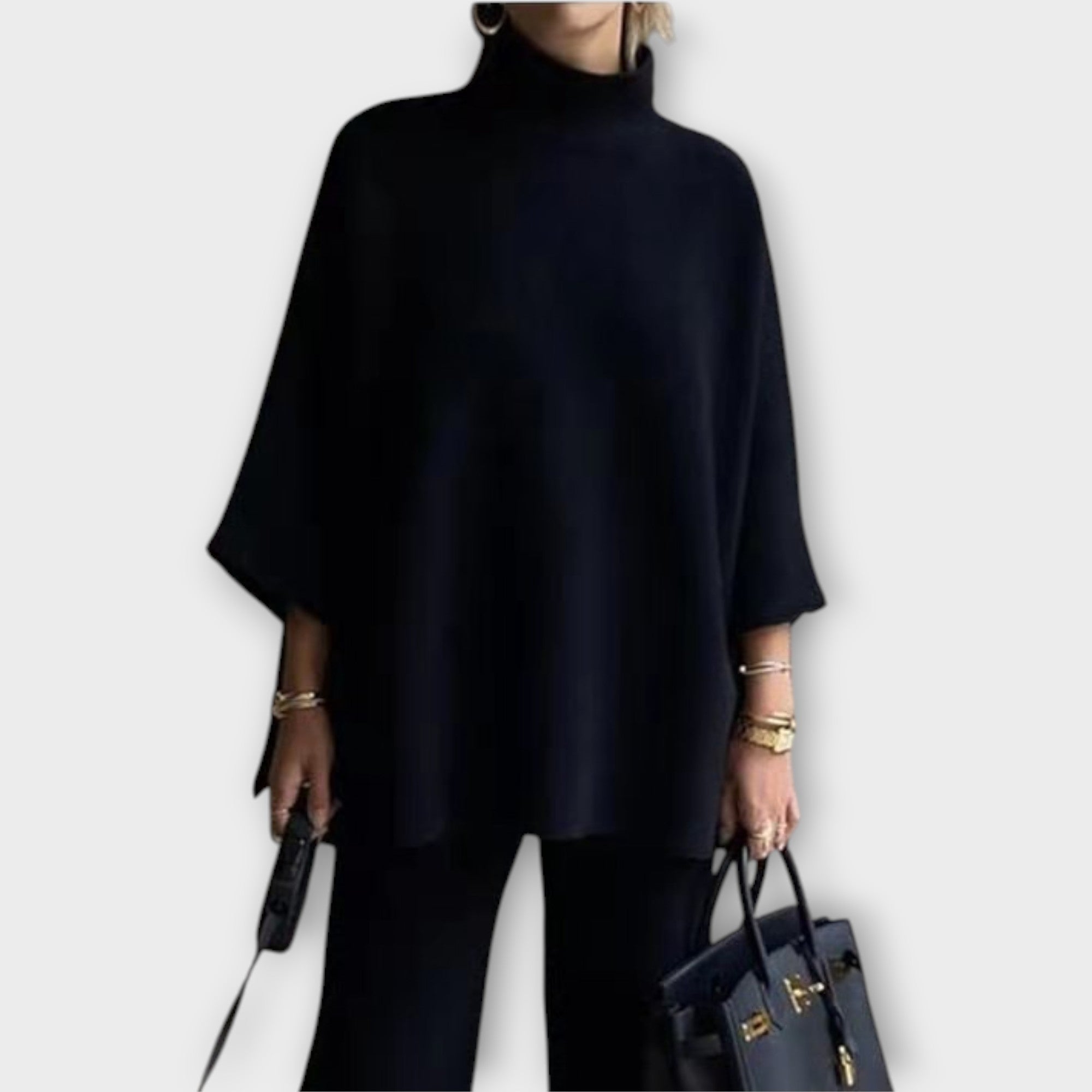 Blusa de punto con corte holgado y cuello alto