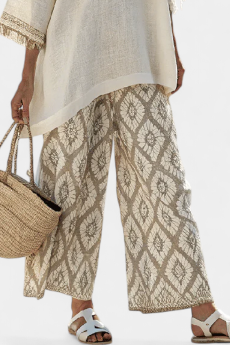 Conjunto Boho Chic Daisy: blusa larga y pantalón estampado para un estilo único