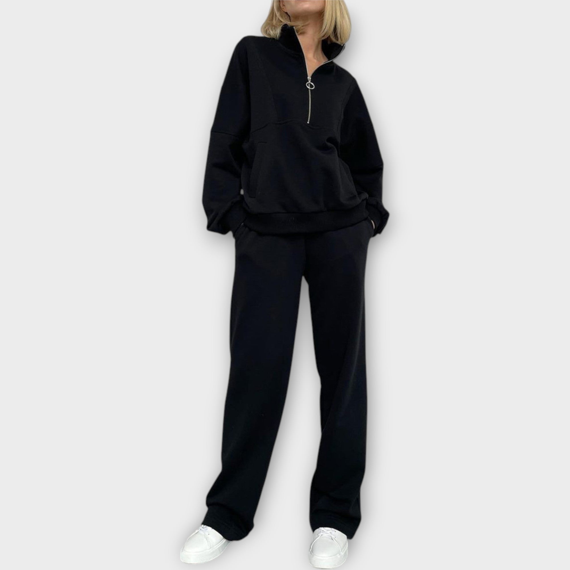 Conjunto con cremallera y estética minimalista