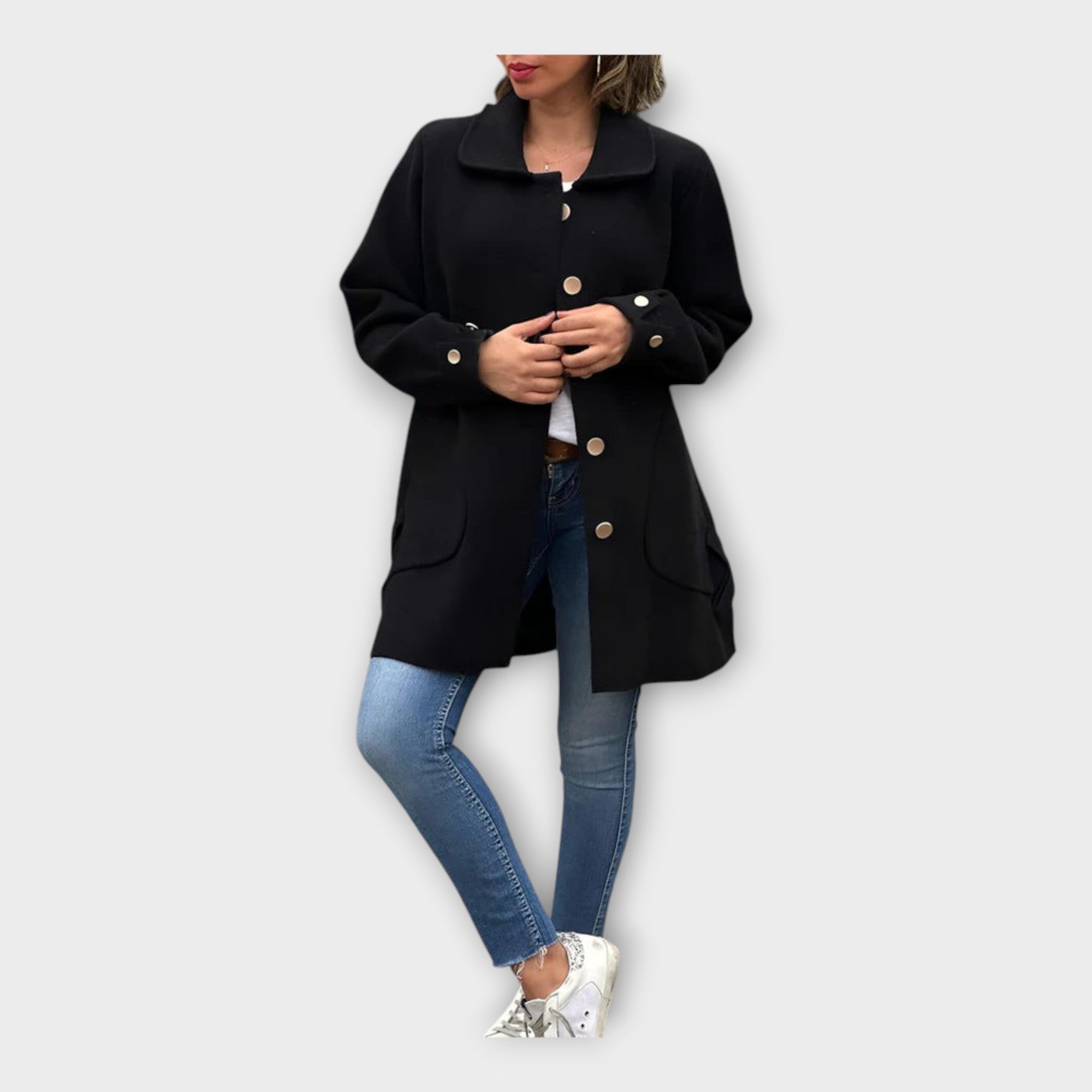 Manteau long aux lignes classiques et boutons