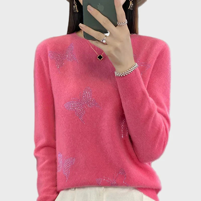 Cuello alto de punto con diseño de mariposa