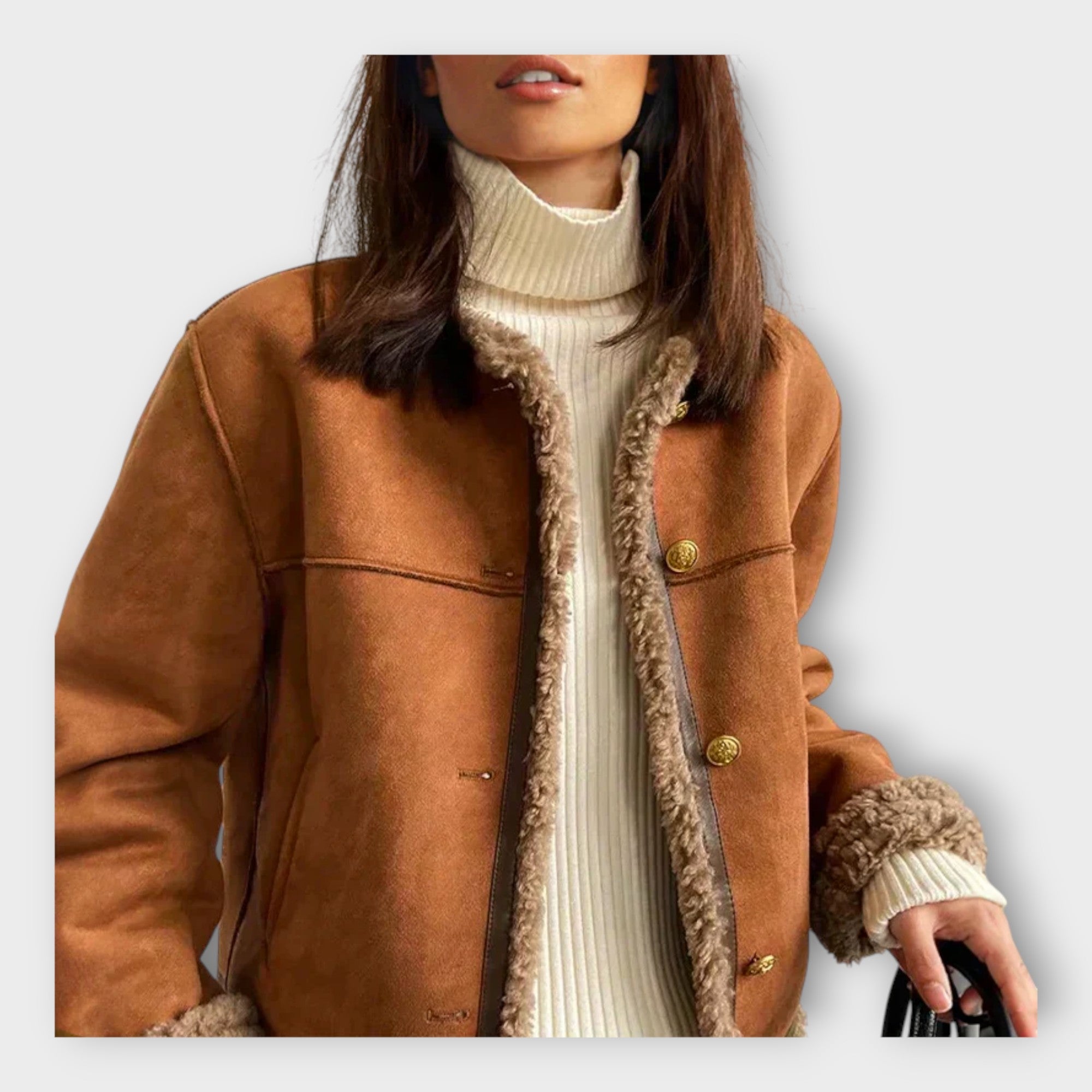 Elegante chaqueta de cuero con forro cálido y estilo atemporal.