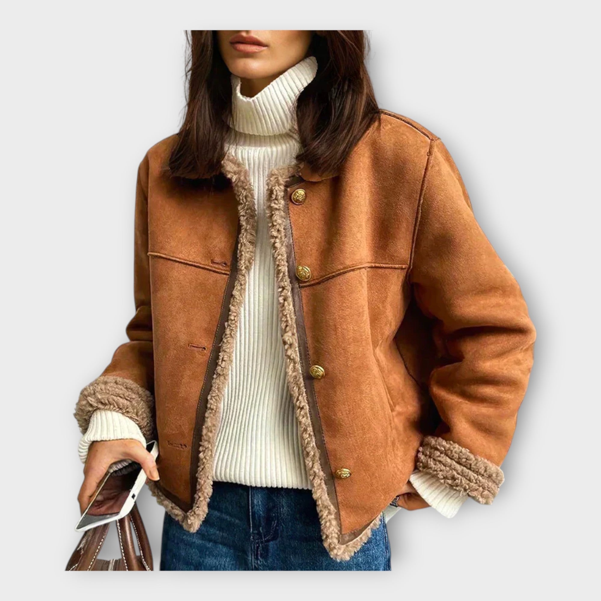 Elegante chaqueta de cuero con forro cálido y estilo atemporal.