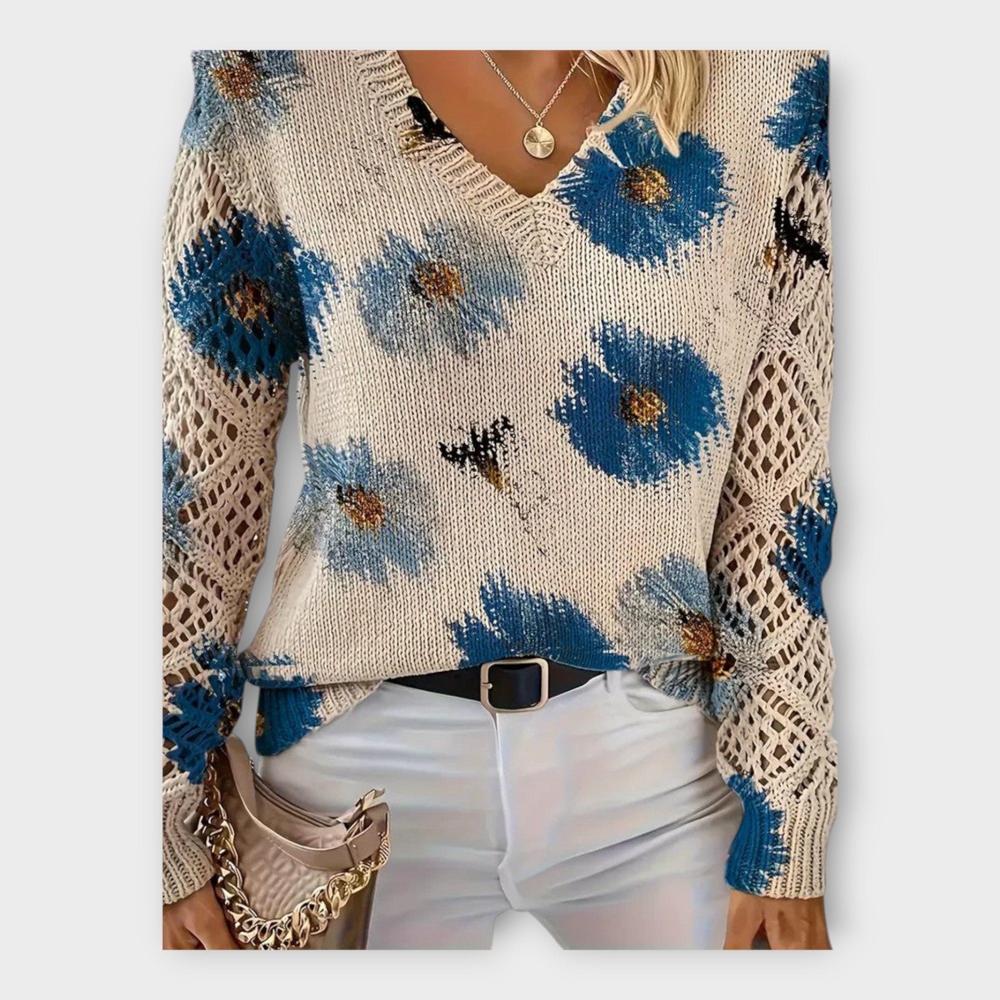 Blusa de punto con detalles de encaje